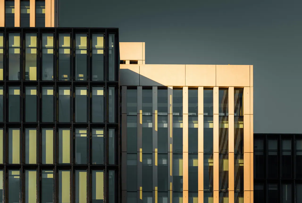 Modern office building with a dark glass curtain wall