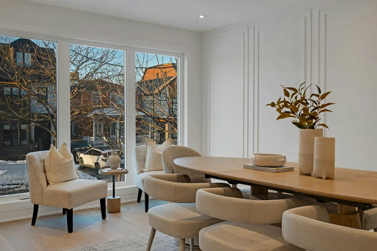 Bright breakfast room with tall windows